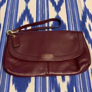 COACH WRISTLET - Burgandy color.